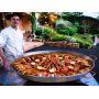 Location Poële à Paella, tartiflettes géantes, colombo de poulet, poulet basquaise, moules frites, émincé de dinde à la normande
